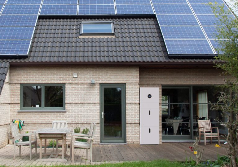 eaton xstorage hybrid house with solar panels getty 180405275 scaled